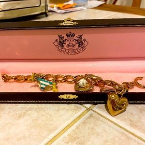 Never worn juicy couture bracelet and charms